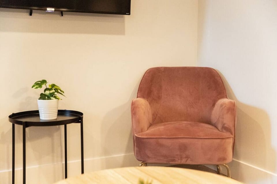 As you take a seat in the living room, the comfortable furniture and tasteful design make it easy to unwind.