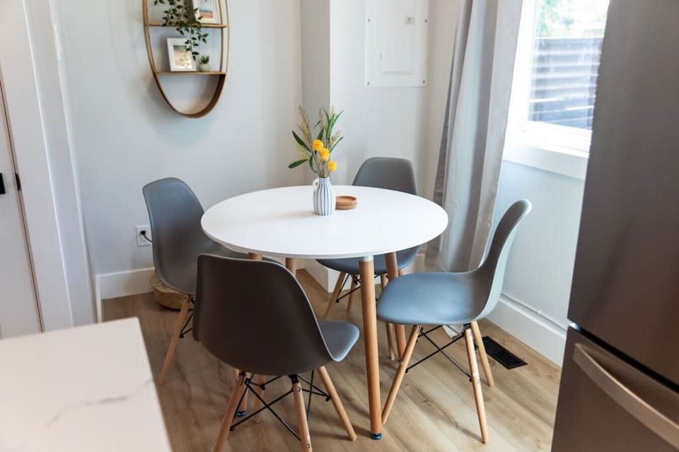 The dining room invites you to savor every moment, whether enjoying a quiet meal or hosting a festive gathering.