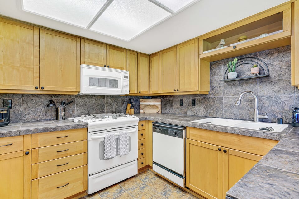 Dishwasher, microwave, full stove and oven, plus plenty of counter space.