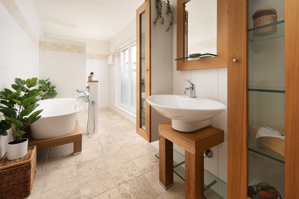 Luxury Studio, Garden View | Bathroom | Hair dryer, towels, soap, shampoo