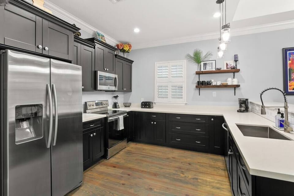 The kitchen is well-stocked with pots, pans, plates and cooking utensils for you to whip up a simple meal