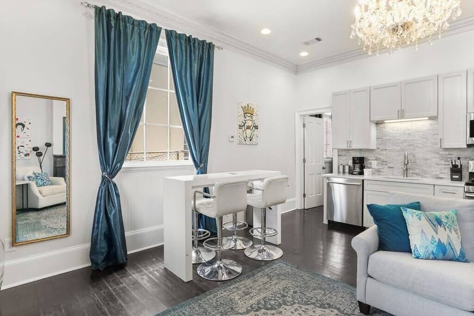 Open Concept Living, Dining and Kitchen area with sofa bed. 