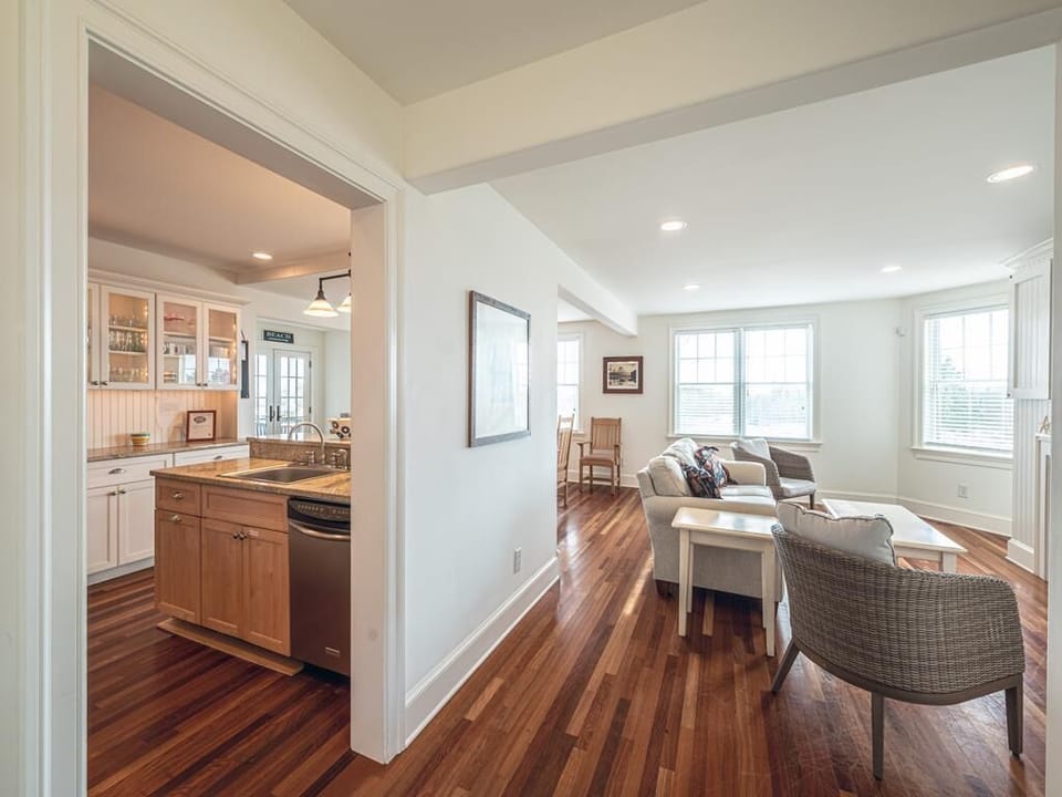 Bright, open-concept living area with hardwood floors and plenty of natural light.