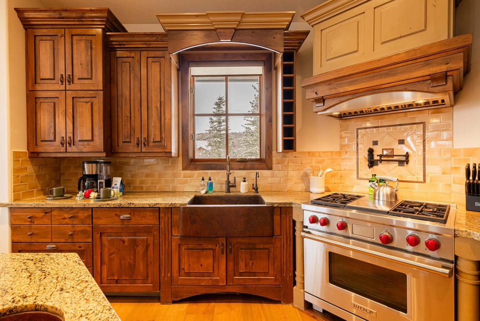Copper Farm Sink, Wolf gas range, and pot filler