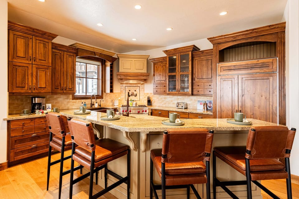 Gourmet kitchen with a SubZero refrigerator / freezer with an ice maker