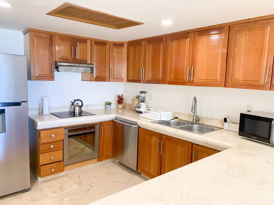 Luxury Condo, Beach View, Beachfront | Private kitchen | Espresso maker, coffee/tea maker