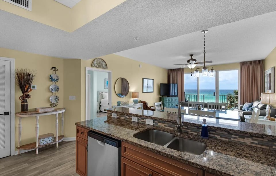 Kitchen has GULF VIEWS, granite countertops, and is fully stocked with more than the basics (coffee/tea bar, oils/salt and pepper, Tupperware, plenty of pots/pans/cookware)