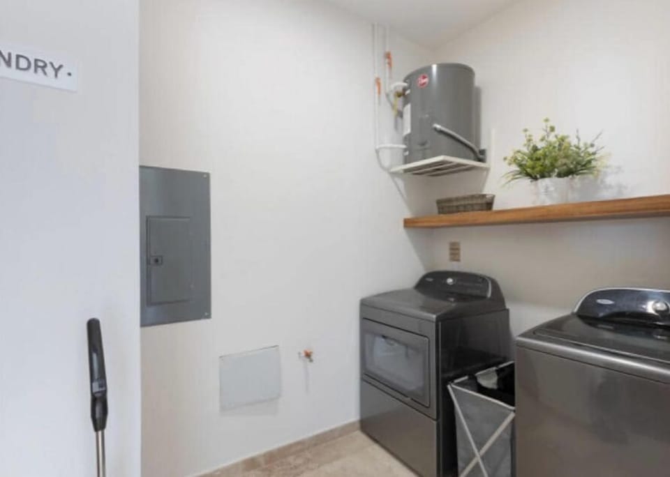 The laundry room in the unit for convenience