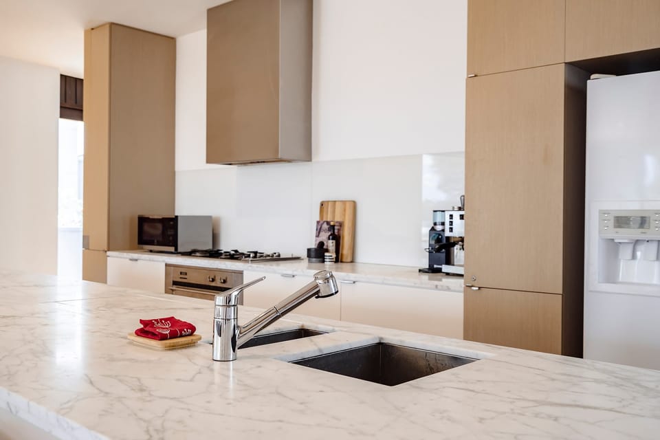 Gourmet kitchen with a marble island bench