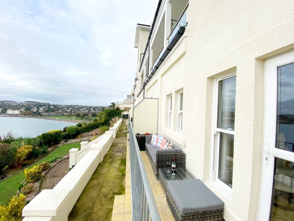 Number 1 Marina Court - private outside terrace with steps down to a communal garden.