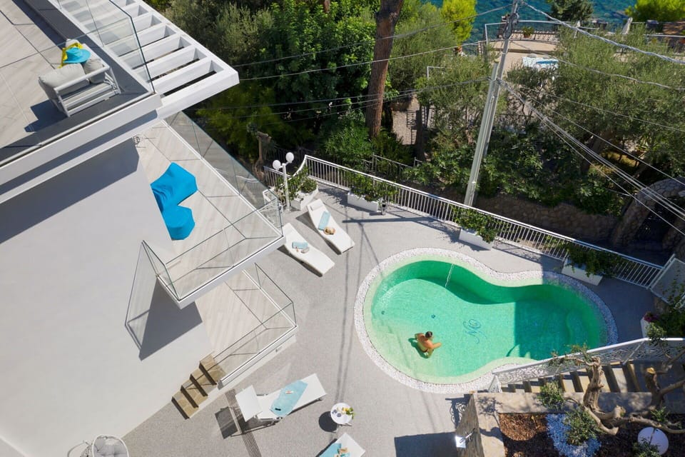 Swimming Pool, Resort, Outdoor Furniture, Composite Material, Eco Hotel, Leisure, Estate, Shade, Villa, Thermae