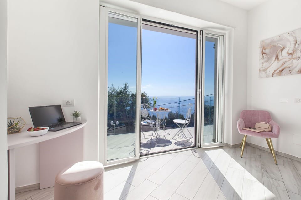 Flooring, Floor, Apartment, Sea, Chair, Balcony, Ocean, Wood Flooring, Coast, Home Door