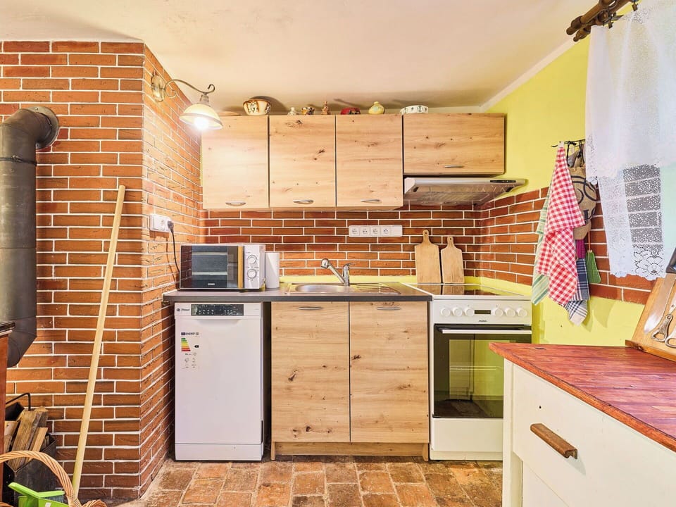 Kitchen, Wood, Major Appliance, Furniture, Countertop, Interior Design, Kitchen Appliance, Flooring, Cabinetry, Room