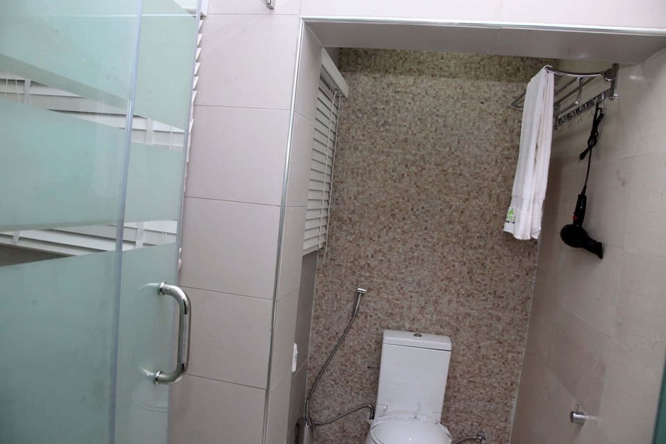 Deluxe Room, Balcony, City View | Bathroom | Free toiletries, hair dryer, towels, soap