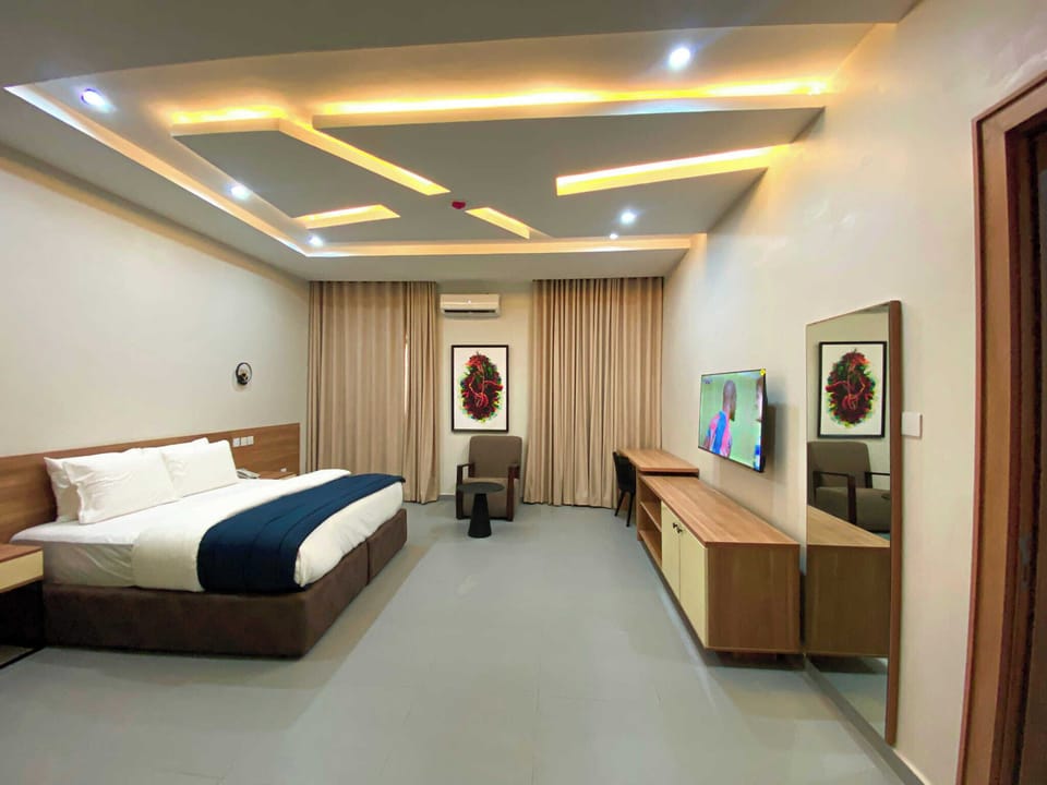 Deluxe Room, Balcony, City View | Desk, laptop workspace, free WiFi