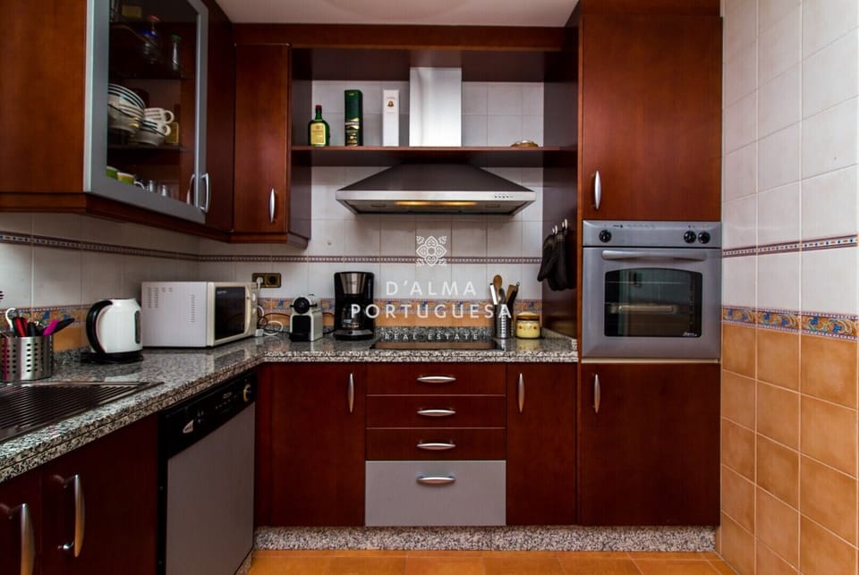Coffee/tea maker, microwave, dishwasher, cookware/dishes/utensils