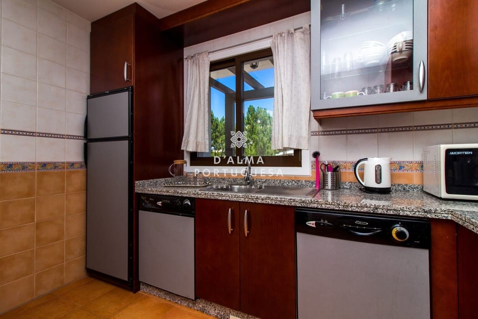 Coffee/tea maker, microwave, dishwasher, cookware/dishes/utensils