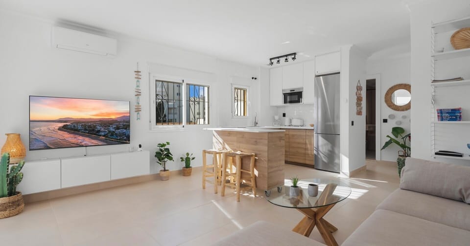 Fully equipped kitchen with a view - cook like a pro, wine in hand.