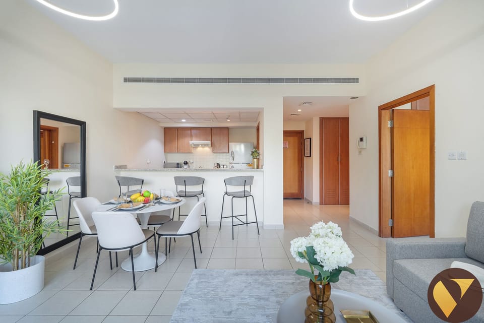 Luxury Apartment | Living area | 65-inch LED TV with cable channels