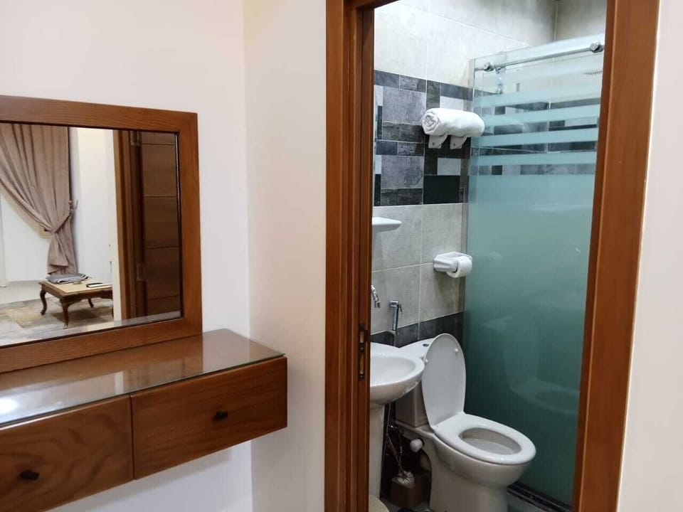 Separate tub and shower, free toiletries, slippers, towels