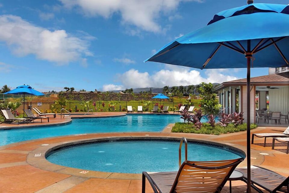 ounge under sunny skies by the refreshing pool.