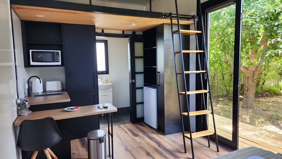 Functional kitchenette with essential appliances for easy and convenient meals.