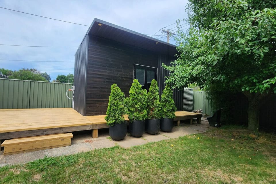 Cozy little deck offering a peaceful spot to enjoy fresh air.