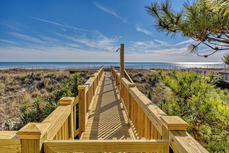 The newly rebuilt catwalk leads straight out to the dunes in front. 
