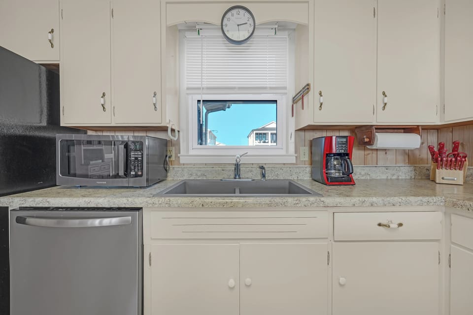 Includes dishwasher, stove, microwave, toaster, fridge, coffeemaker, and more