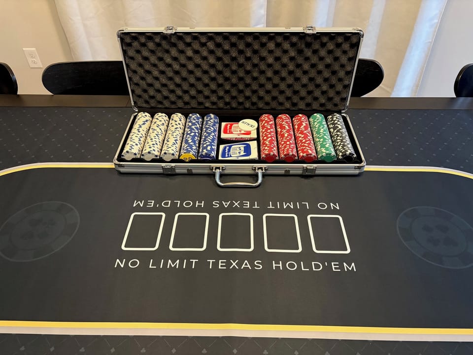 500-piece poker chip set and mat for Texas Hold 'Em or Blackjack. Have fun!