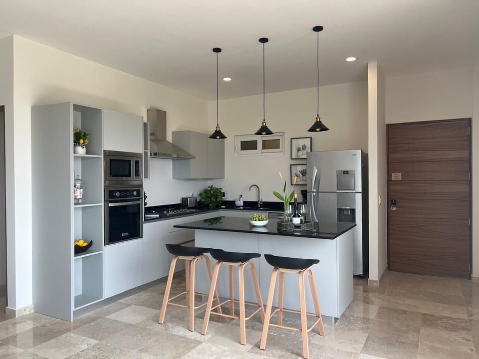 Apartment, Balcony, Partial Ocean View | Private kitchen | Coffee/tea maker