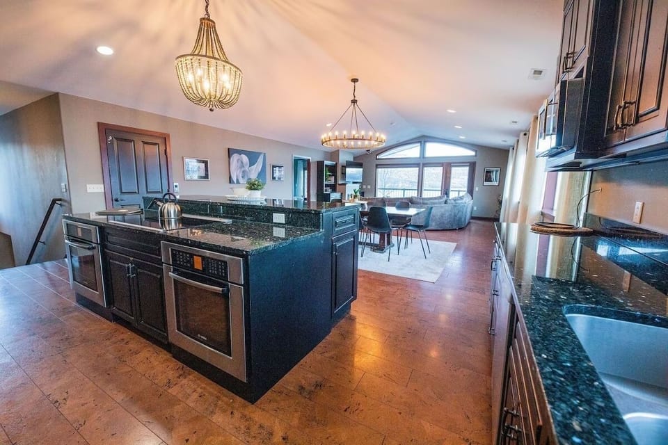 Vaulted ceilings, modern open floor plan.