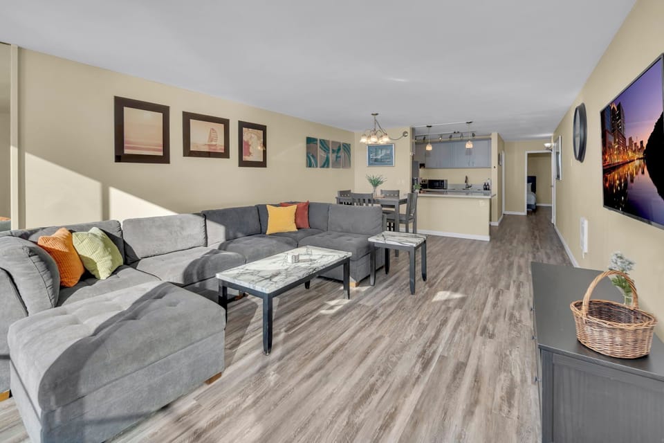 Living room with huge sofa and smart TV