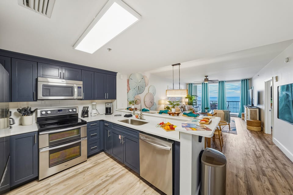 Whether you're cooking, chatting, or simply soaking in the view, this is a space that brings everyone together effortlessly.