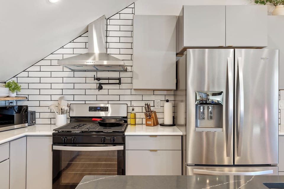 Cook up a feast in this fully stocked kitchen, equipped with modern appliances 