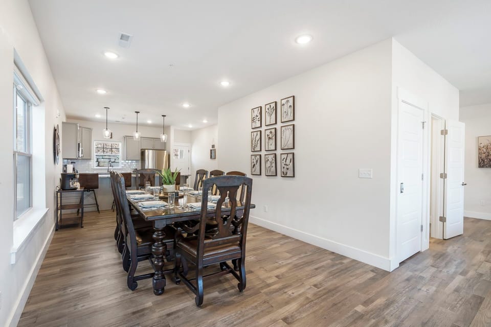Dining Area with Two Tables and Bar Seating