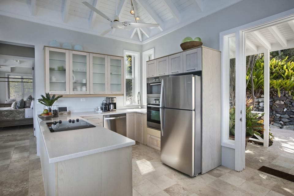 Fully Equipped Kitchen Full kitchen in the great room with coffee provided—cook or snack with island views.