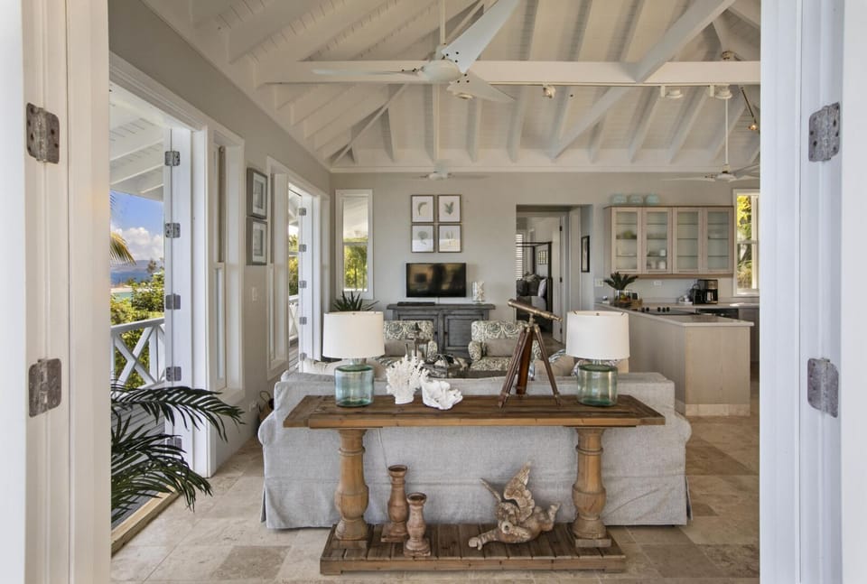 Open the doors to the great room, and savor the sound of the sea from the sofa.