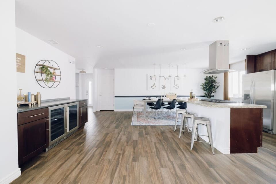 Spacious dining area that opens seamlessly to the kitchen — perfect for group dinners and entertaining.