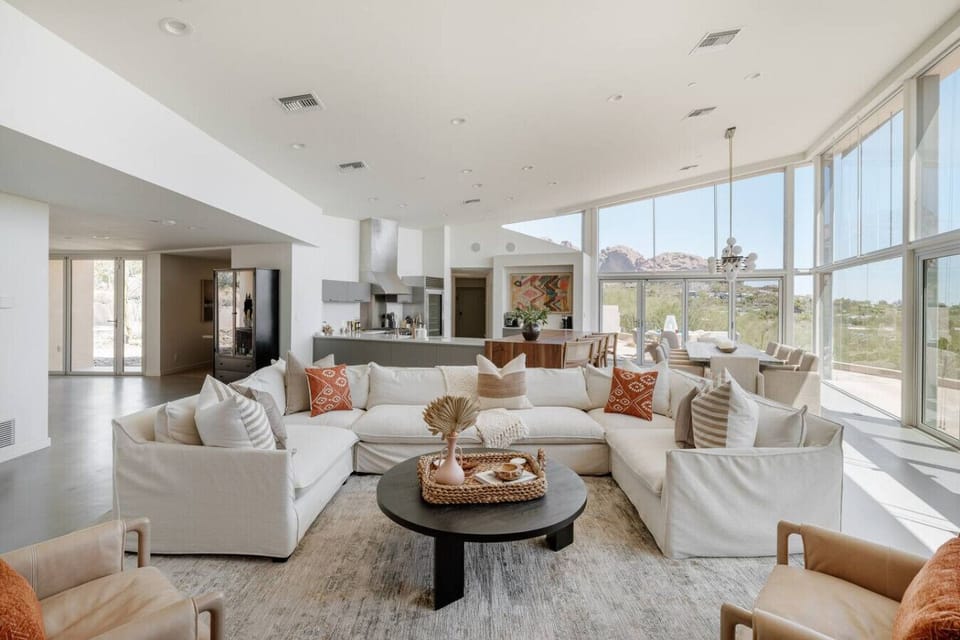 This spacious property is designed to capture stunning views from every angle, ensuring that you can enjoy the breathtaking scenery no matter where you are. With its thoughtful luxurious features, this home is sure to please everyone who steps inside