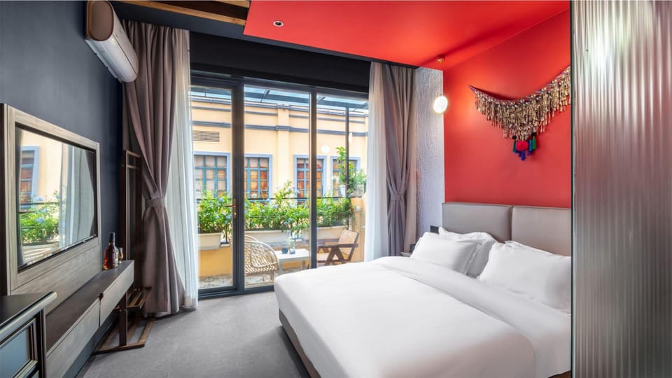 Superior Double Room, City View | Down comforters, minibar (free items), desk, laptop workspace