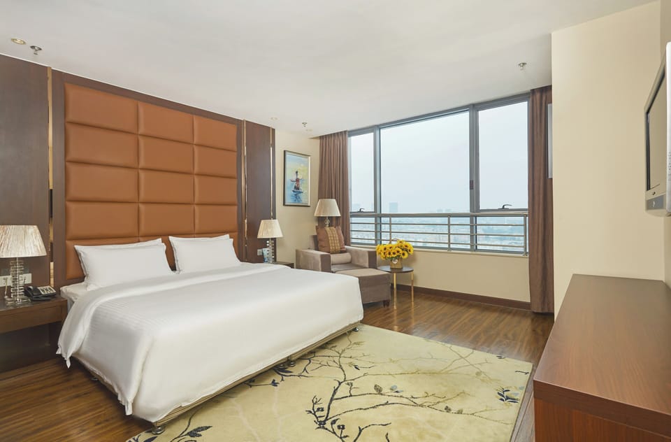 Family Suite, 2 Bedrooms | Down comforters, minibar (some free items), in-room safe, desk