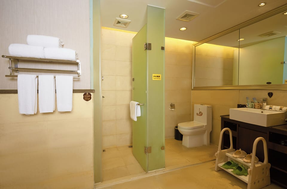 Hair dryer, slippers, towels, soap