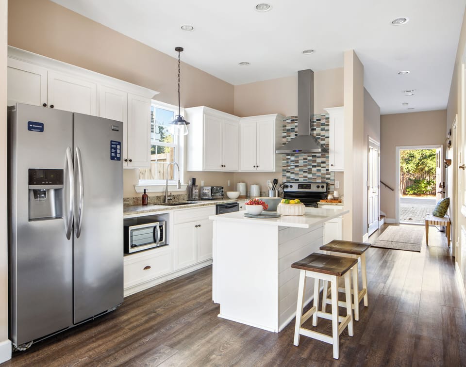 Step through the hallway into the heart of the home—a welcoming and functional kitchen awaits!