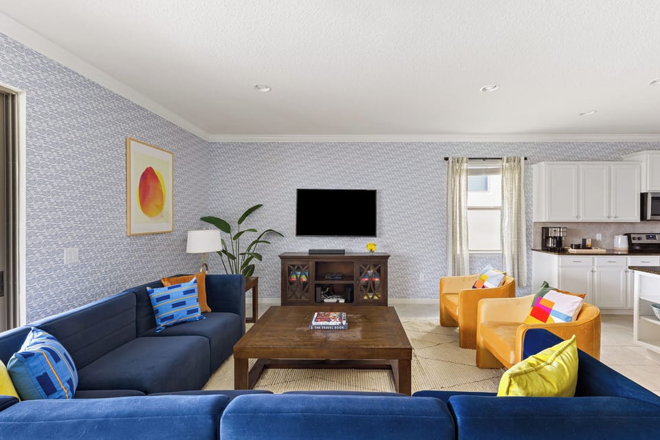 Oversized couches face 70-inch smart TV