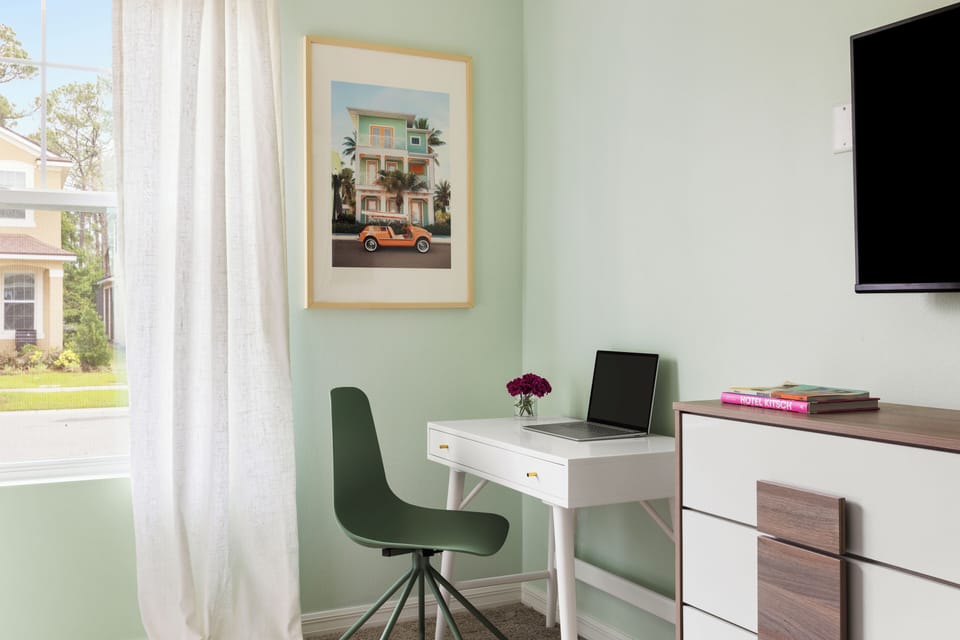 Laptop-friendly table in the primary bedroom.