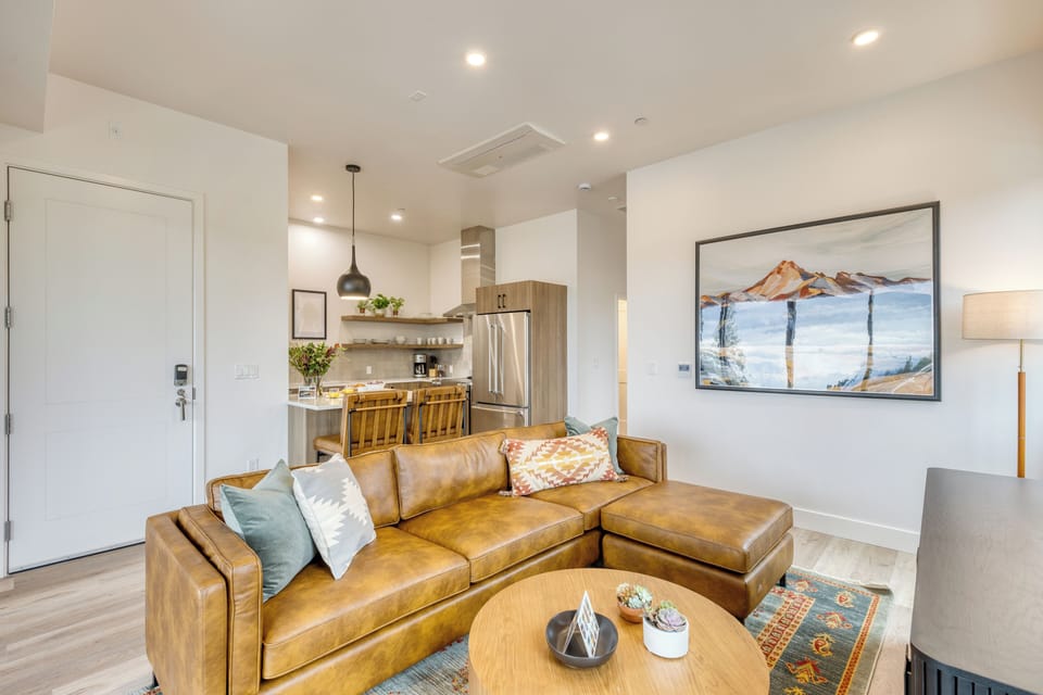 Stylish living area with open kitchen flow.