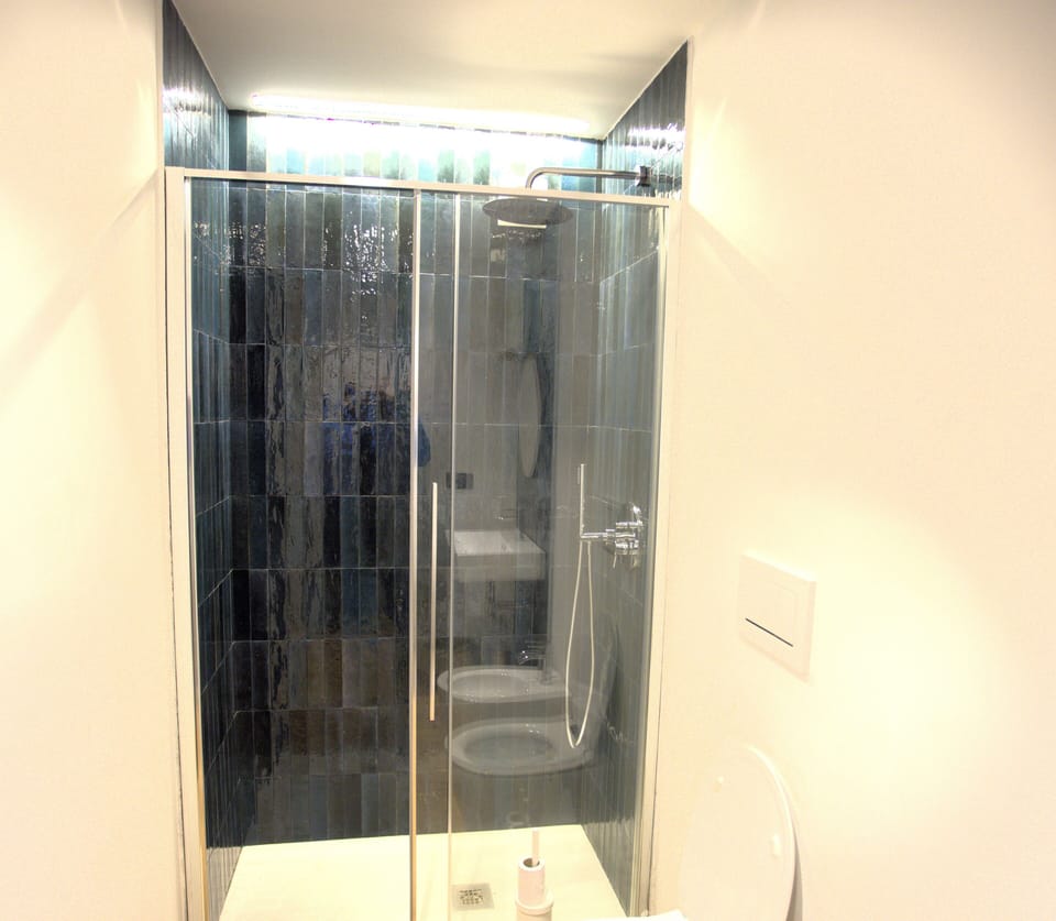 Bathroom | Hair dryer, towels, soap, shampoo