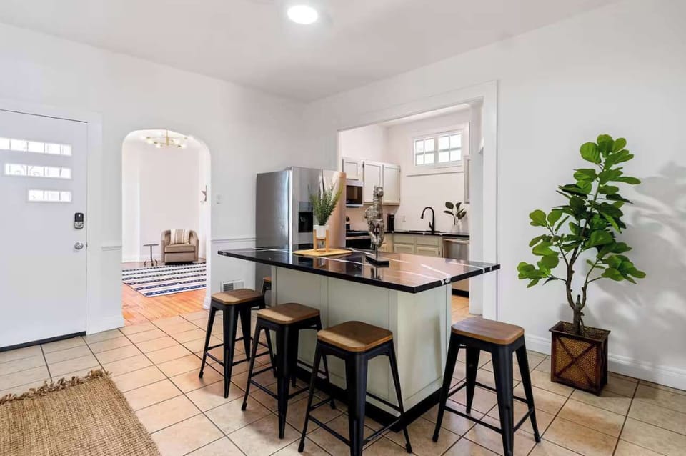 Kitchen/Dining: Bright and spacious kitchen featuring top-of-the-line appliances, plenty of counter space, and all the tools for preparing your favorite meals.