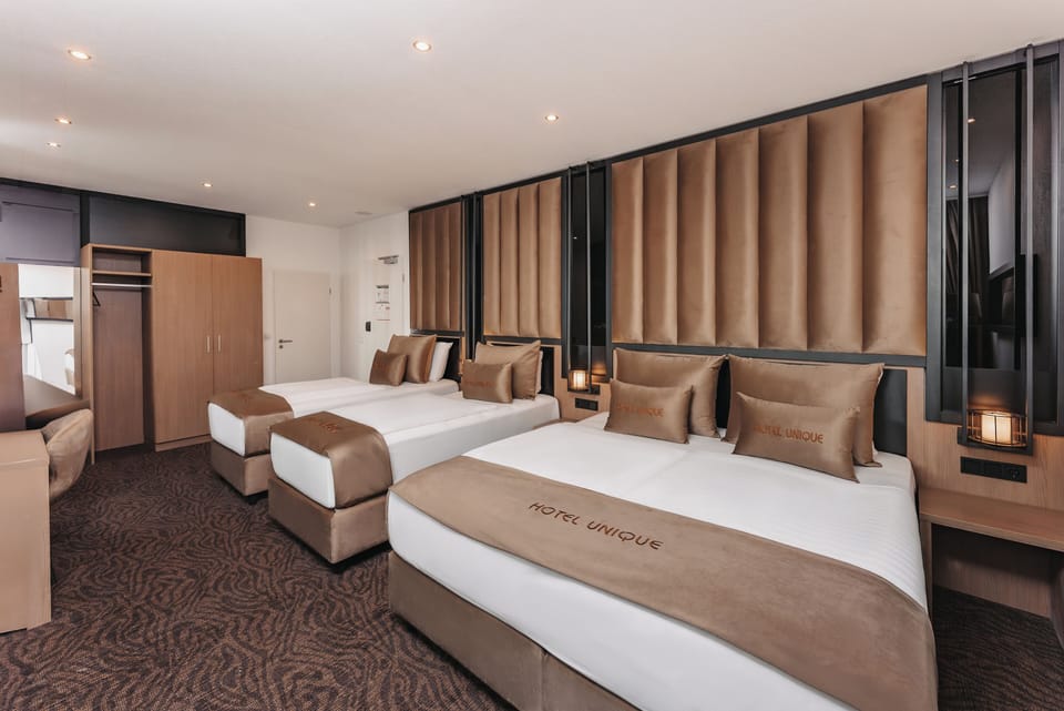 Family Quadruple Room | Premium bedding, in-room safe, desk, laptop workspace